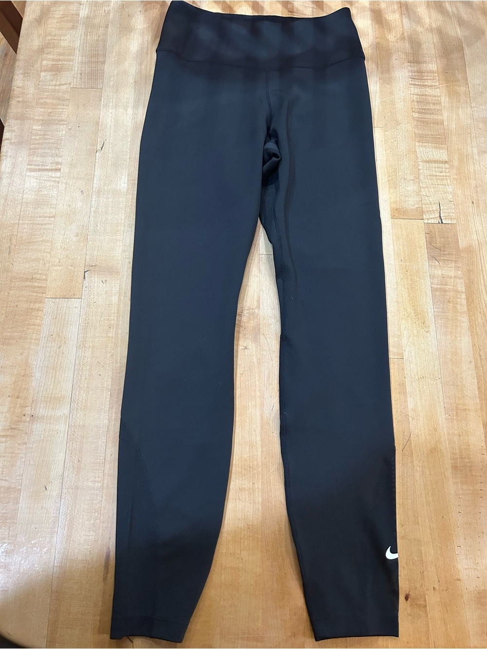 Nike Kids Black Athletic Leggings with White Swoosh